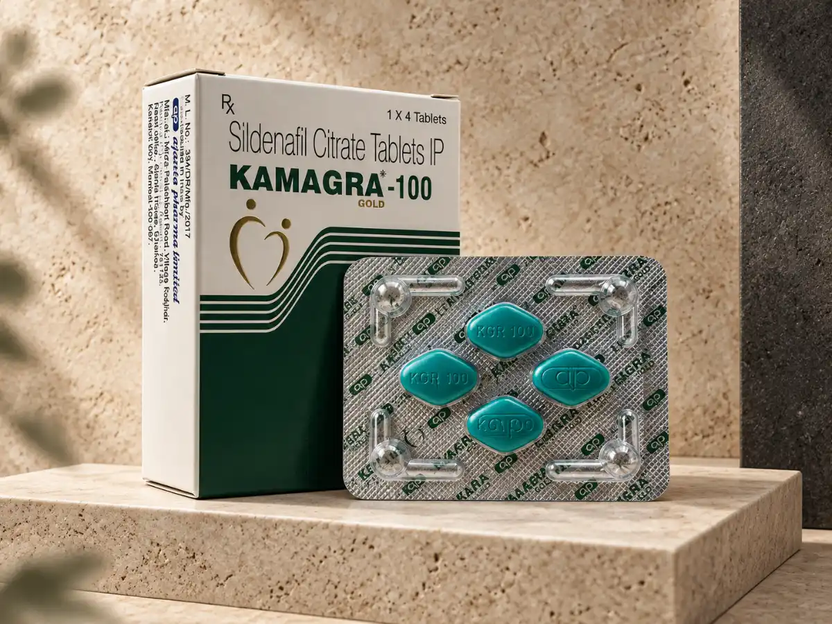 Kamagra Gold 100 mg – kutija i blister sa 4 tablete na travertin podlozi